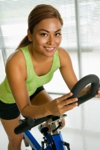 Best Exercise Bikes 2020 - Athlete Working Out on a Schwinn Indoor Cycle